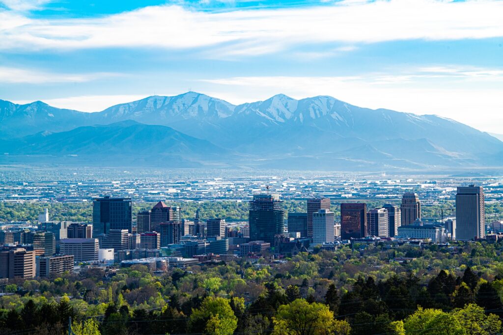 Salt Lake City beauty scene. city skyline across green mountain during daytime