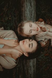 Photo of Two Women Lying on Grass | Beauty Sleep