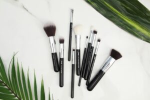 10-piece Black Makeup Brush Set on White Panel