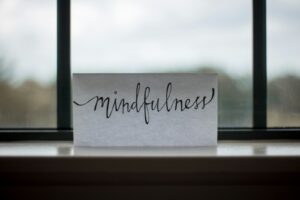 mindfulness printed paper near window | Mindfulness Practices