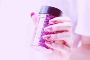 person holding pink container | Gel Manicure