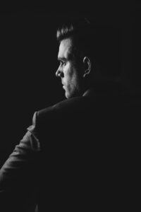 grayscale photo of man wearing blazer | Male Grooming