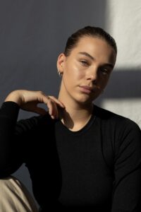 woman in black long sleeve shirt | Facial Treatments