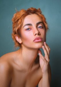 a woman with freckled hair is posing for a picture | Natural Makeup Look