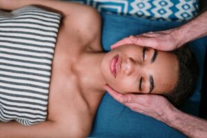 A serene facial massage providing relaxation and stress relief. | Basic Skincare and Facial Treatments Routine