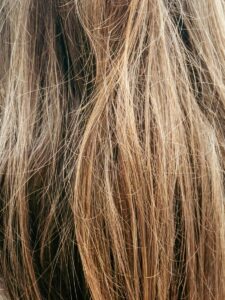 Close-up of messy, tangled blonde hair